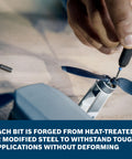Using a bit from the Two-In-One 42-Piece Extra Hard Precision And Standard Screwdriver Bit Set with Two Magnetic Handles on electronics.