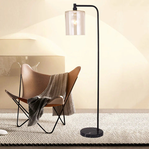 Dope Matte Black 1 Light Floor Lamp With Curved Arm And Marble Base Indoor Modern Lighting For Living Room Or Bedroom ETL Listed Minimalist Yet Dramatic Statement Piece beside chair