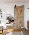 Heavy Duty 6.6-Foot Sliding Barn Door Hardware Kit With Ultra Quiet, Smooth Operation, No Sweat Installation, Fits 39.6 Inch Wide Single Door Panel, Flower Style Black installation in cozy living room setting.