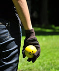 Person wearing heavy duty cotton work gloves for adults unisex regular size large black case pack 300 pairs durable 9oz strong grip