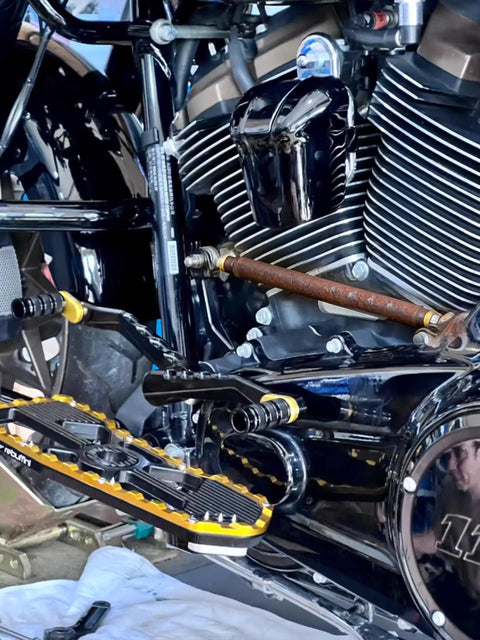 Shift Linkage Upgrade For Harley Softail Touring Trike 1986 Through 2025 Blue Aluminum Built Tough For Smooth Crisp Shifts On Touring And Trike Rigs For Quick Clean Shifts, close-up installed on engine