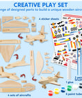 All In One DIY Wooden Airplane Craft Kit For Kids Ages 6 To 12 Totally Kid Friendly Build Four Aircraft And Paint With Six Paint Tubs Two Brushes And Stickers Easy To Follow Instructions Great Birthday Gift For Young Builders image showing wooden airplane parts, sticker sheets, glue, and paints.