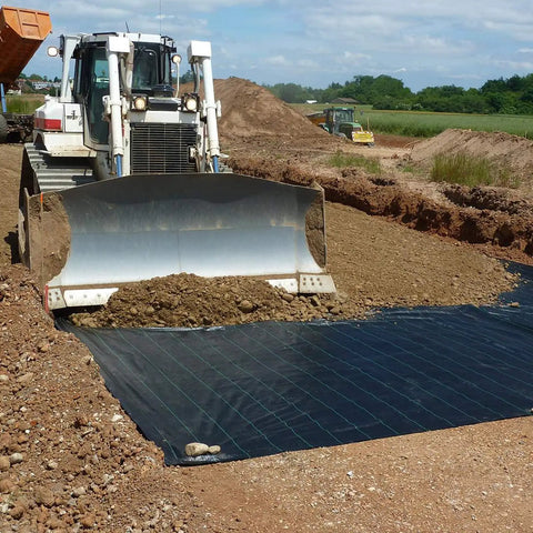 Tough As Nails Pro Grade Heavy Duty 3.5 Oz Landscape Fabric 6x300 Ft Weed Barrier installed under soil for road construction