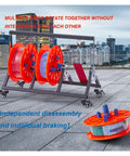 Heavy Duty Folding Cable Rack Pro Grade Wire Dispenser with Anti Tangle Slots and 5 Roll Capacity on rooftop with city view