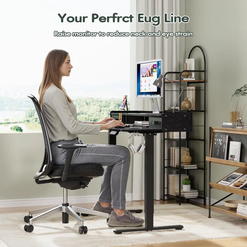 Woman using Electric Standing Desk With Two Drawers And Monitor Shelf Adjustable Height Sit Stand Desk With Splice Board Quick Install For Home Office Black 48 Inch Easy Setup Game Changing Organization For Your Workspace in home office