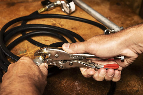 Using Five Piece Curved And Long Nose Locking Pliers Set With Wire Cutter Angled Teeth For Superior Grip on hose fitting