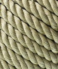 Close-up of 100 Feet Three Strand Twisted Polypropylene Rope Manila Rope Substitute for Indoor and Outdoor Use in tan color