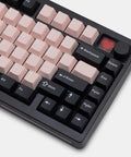 Close-up view of Compact Wireless Mechanical Keyboard With Tri Mode Connectivity And A Slick Dot Matrix Screen Plus Custom Volume Knob.