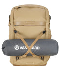 Front view of Metro B30L 30L Camera Backpack With Convertible Daypack In Beige, rolled mat attached below, travel ready for creators.