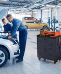 Heavy Duty 30 In Tool Storage Cabinet With Roll Through Lockable Casters, Garage Workshop Chest in use at auto repair shop.