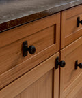 Matte Black Cabinet Knobs Set Five Pack One And One Quarter Inch Round For Dressers And Drawers Kitchen Cabinets Vanity Furniture And Closet Doors Durable Metal Hardware For Easy Weekend Update Franklin Brass installed on a wooden cabinet