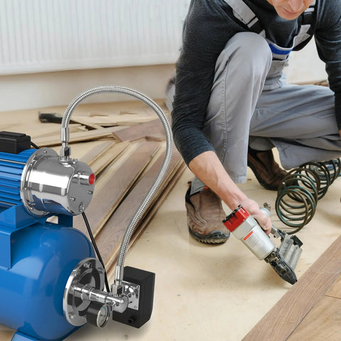 Beefy 20 Inch Air Compressor Jumper Hose With Quarter Inch Swivel End And Quick Snap Adapter For No Leak High Pressure Pneumatic Gear Up To 870 Psi Rating, shown connecting to pneumatic nail gun.