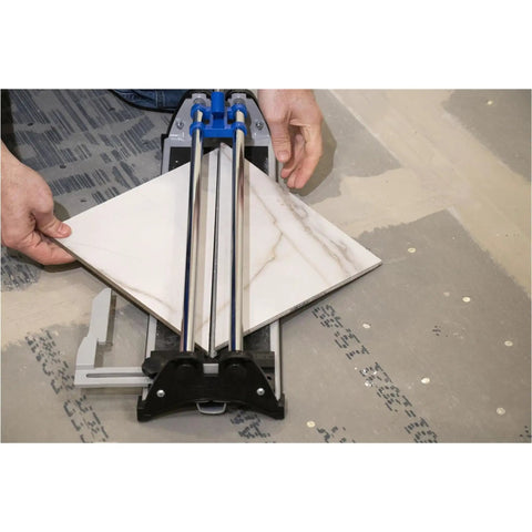 17 Inch Tile Cutter For Ceramic And Glass Mosaic Tiles, DIY Friendly Tool in use, cutting a tile with precision on a floor