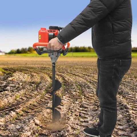 Person using Gas Powered Post Hole Digger With 2.3HP Engine Earth Auger Kit With 3 Drill Bits And 11.81 Inch Extension Rod in a field