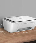 DeskJet 2855e Wireless All In One Color Inkjet Printer Scanner Copier For Home Use With 3 Month Instant Ink Trial Included 2.4 GHz Wireless Only AI Powered Page Precision on desk showing dimensions.