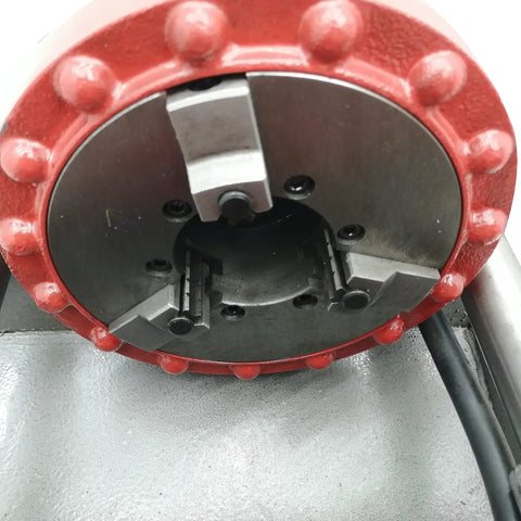Close-up of the auto die head on Built Tough Electric Pipe Threader Machine for 1/2 to 3 inch steel tubing.