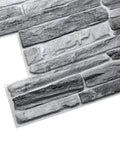 Dark Grey Faux Slate PVC 3D Wall Panels Pack Of 10 For Quick Easy Accent Wall Makeover Each Panel Measures 3.3 Ft By 1.7 Ft 98 Cm By 50 Cm 5.61 Sq Ft Coverage Rustic Textured Interior Design Paneling, showing close-up texture of faux slate.