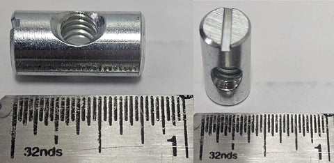 Bulk Pack Of 12 M6 Cross Dowels Barrel Nuts With P1.0 Threads, 20mm Length And 10mm Diameter, shown with ruler for scale