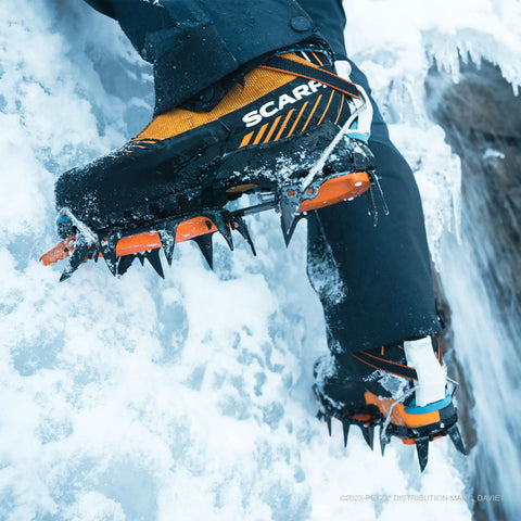 Ice climbing with crampons on icy terrain for use with Heavy Duty Crampon Pouch Fakir Pro Grade Weather Resistant Storage Bag