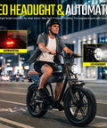 Man riding Beast Mode 1500W Peak Electric Fat Tire Bike for Adults, city street at night, LED headlight on
