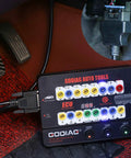 Auto ECU Breakout Box GT100 OBDII Protocol Detector attached under car dashboard for diagnostic use