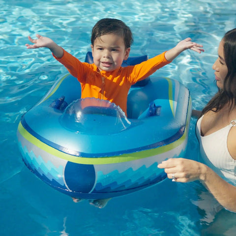 Child in Remote Control Baby Pool Float With Enclosed Propeller Guard, Motorized Toddler Boat For Ages 1 To 4, in pool