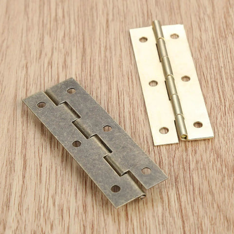 Antique Bronze Decorative Hinges Set For Wood Box And Cabinet 4 Pack 60 By 20mm Butt Hinge on wood surface, two hinges
