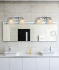 Two Light Chrome Vanity Wall Sconce Lighting With Frosted Glass Shade above modern bathroom mirror