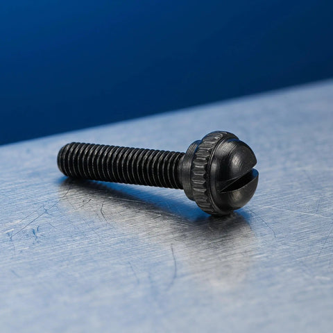 Black M2.5x18.5mm Tuner Peg Screw for Classical Guitar with slotted head on metal surface, secure fastening replacement part