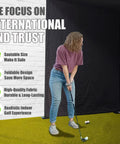 Person practicing golf swing indoors with Foldable Golf Enclosure Kit For Home Use With Easy Setup And Space Saving Indoor Golf Simulator.