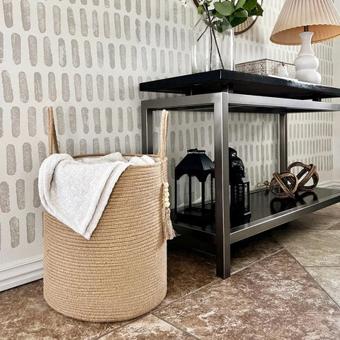 Tall Woven Laundry Basket for Living Room and Bedroom, Boho Farmhouse Round Wicker Blanket Basket near console table.