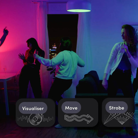 People dancing in a room lit by A19 Smart LED Light Bulb With 1100 Lumens, Billions Of Colors And Tunable White From 1500K To 9000K
