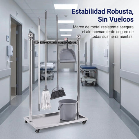 Go-To Floor Standing Mop And Broom Storage Rack For Schools, Factories, And Maintenance Crews - Heavy-Duty Cleaning Tool Holder, Movable Organizer, Keeps Cleaning Supplies Neat, Accessible, Ready To Use. stainless steel mop and broom rack on wheels in hospital hallway