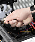 Person using ESD Wrist Strap With Grounding Cable And Detachable 5ft Cord For Safe Static Discharge Reducing Shock Risk, adjusting PC.