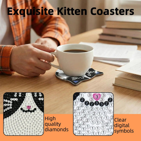 Six Cat Diamond Painting Coaster Kit Set With Double Tools For Adults And Kids DIY Diamond Art Crafts Non Slip Heat Insulation Coasters Perfect Gift Great Holiday Gift Idea shown on table with coffee mug on top.