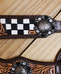 Close-up of Top Shelf Western Leather Horse Tack Set Bringing The Boss Vibe To Every Ride with floral carving and antique details.