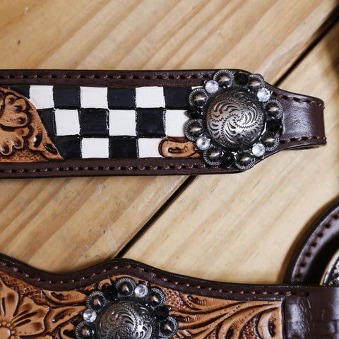 Close-up of Top Shelf Western Leather Horse Tack Set Bringing The Boss Vibe To Every Ride with floral carving and antique details.