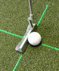 Solid Side Laser Putting Trainer For Righty Golfers Groove Plus Alignment Tool on green turf with golf ball and laser line.