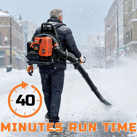 Person using Beast Power 72cc Gas Backpack Leaf Blower With Cruise Control, 880 CFM At 275 MPH for snow removal on street.