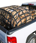 Rock Solid Heavy Duty Cargo Lifting Net with Tear Proof Polyester Webbing and Non Slip Hauling Straps securing boxes in pickup truck.