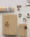 Straight Up Premium Brown Kraft Paper Roll Hella Thick For Rustic Gift Wrapping And Diy Crafts, gifts wrapped with crafts tools.