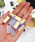 100 Pack Self Adhesive Sneeze Guard Clips No Fuss Peel And Stick Brackets For Clear Acrylic Sign Holders in hand