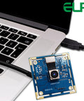 8MP USB Camera With Autofocus For PC, Raspberry Pi And Laptop, UVC 2.0 Mini Webcam Board With IMX179 Sensor next to laptop