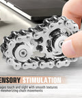 Metal Fidget Spinner With Bike Chain Design for adults, 304 stainless steel, sensory toy for ADHD and anxiety relief, handheld use.