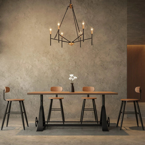 Bold Black 6 Light Modern Chandelier With Gold Finished Lamp Holders hanging above a dining table in a minimalist room