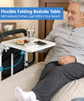 Elderly man using Bed Rails For Elderly Safety With Two Ergonomic Handles, 18 Level Adjustable Height, Foldable Table And Storage Pocket