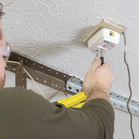 Heavy Duty Garage Door Opener Surge Protector For Single Opener With 15A 125VAC 1875W UL Listed Protection installed on a wall outlet