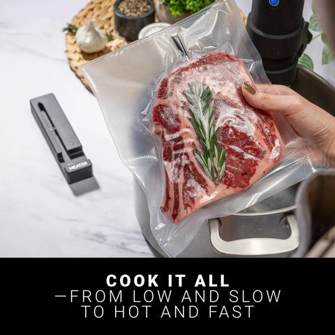 100 Percent Wireless Smart Meat Thermometer With Dual Temp Sensors And Guided Cook System displayed beside vacuum-sealed steak