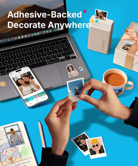 Person using Portable AI Photo Printer For iPhone And Smartphone, Instant Mini Sticker Printer With Bluetooth, Dye Sublimation 3 Inch Prints, 50 Sheets 2x3 Adhesive Paper, 5 Cartridges, Gold Finish, near a laptop and phone, surrounded by printed photos.