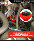 Three Piece Power Steering Adapter Kit for Manual Vacuum Pumps installed in engine compartment with Ford adapter visible